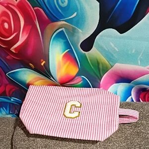 Striped Pink Cosmetic Pouch with Gold 'C' Patch